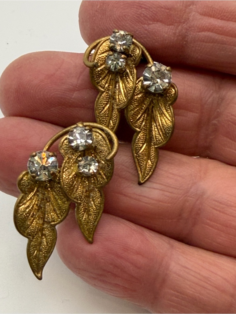 Vintage West Germany gold tone rhinestone leaf clip on earrings